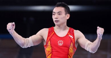 gymnastics-china’s-zou-wins-parallel-bars-gold-–-reuters